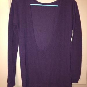 Bright purple sweater with open back